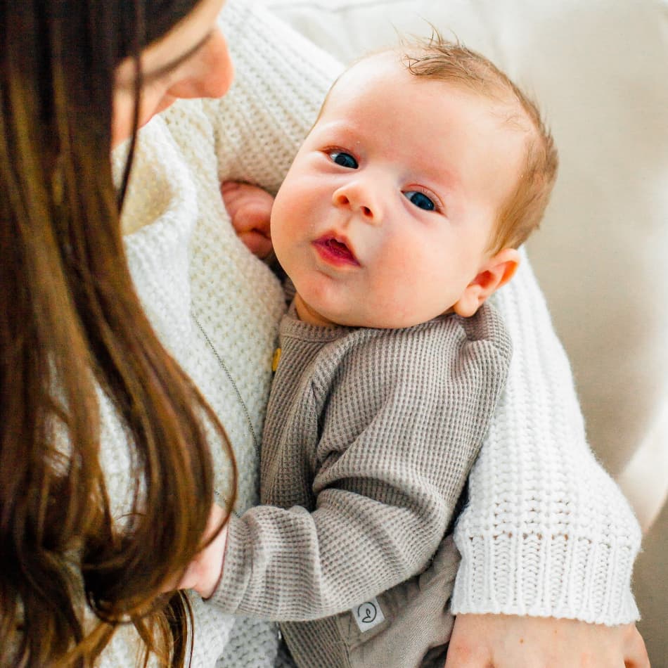 Infant gazing at the screen on the 'Breastfeed with Confidence' page