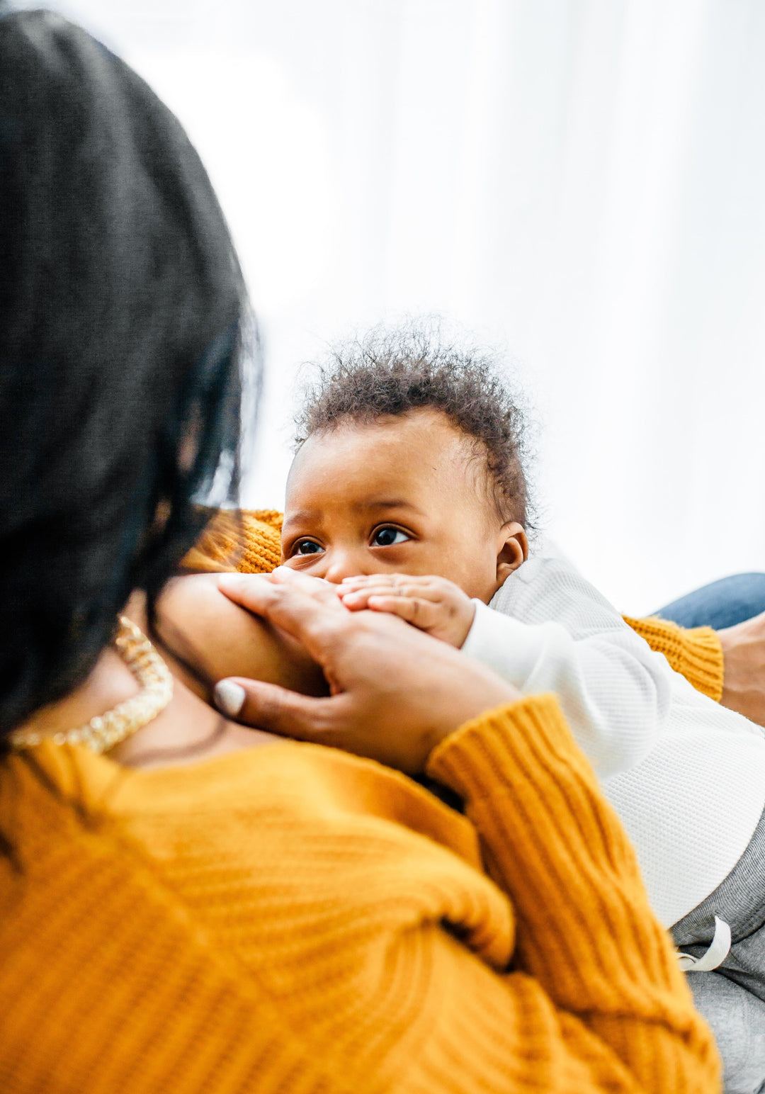 Mother breastfeeding baby